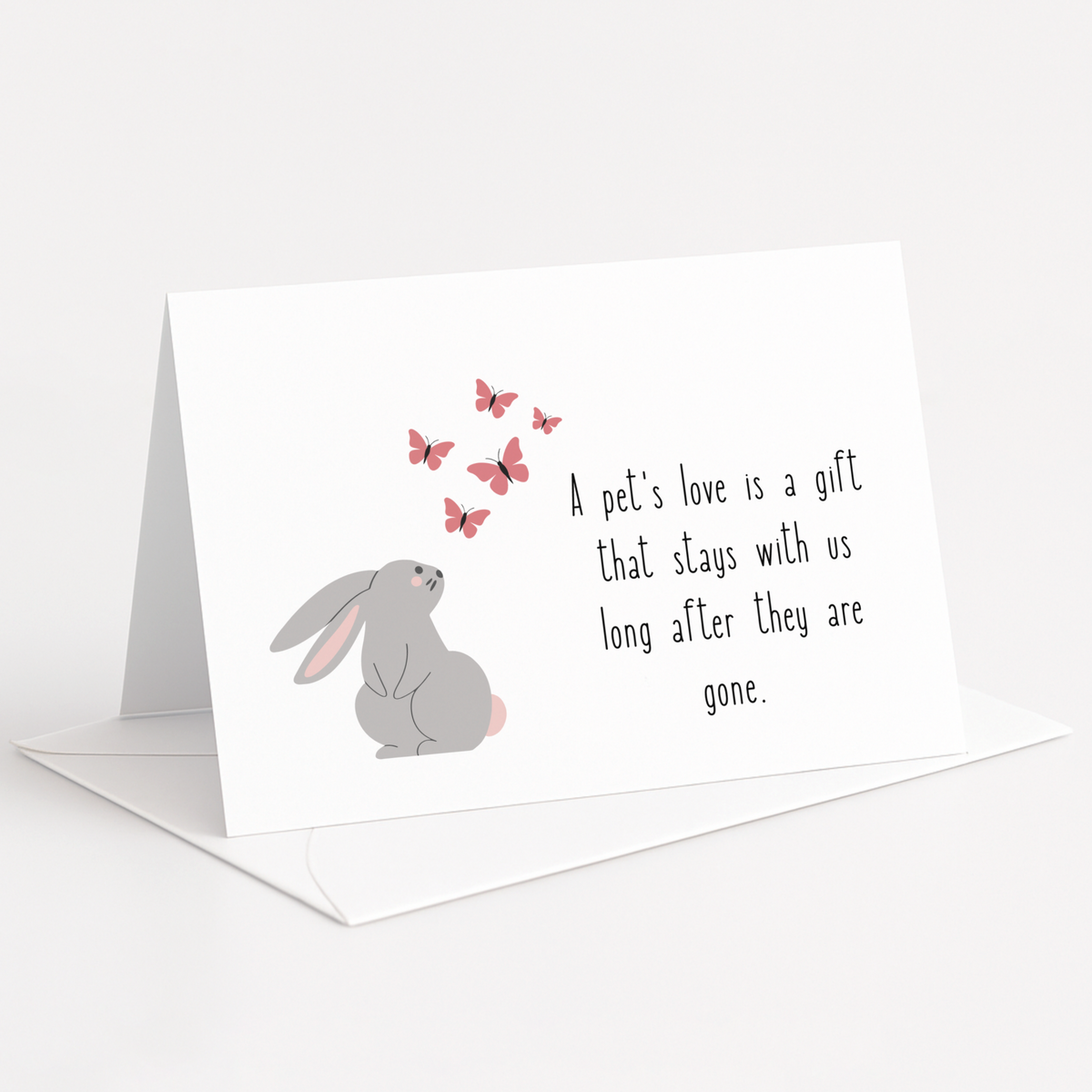 Greeting card with a rabbit illustration and butterfly graphics on a white background