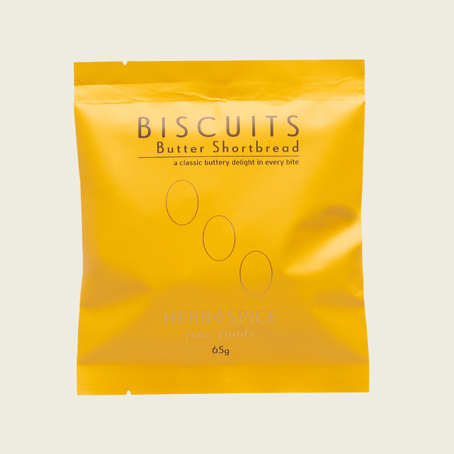 Yellow package of Butter Shortbread biscuits on a beige background