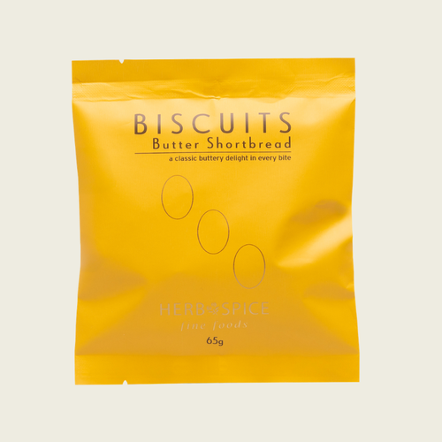 Yellow package of Butter Shortbread biscuits on a beige background
