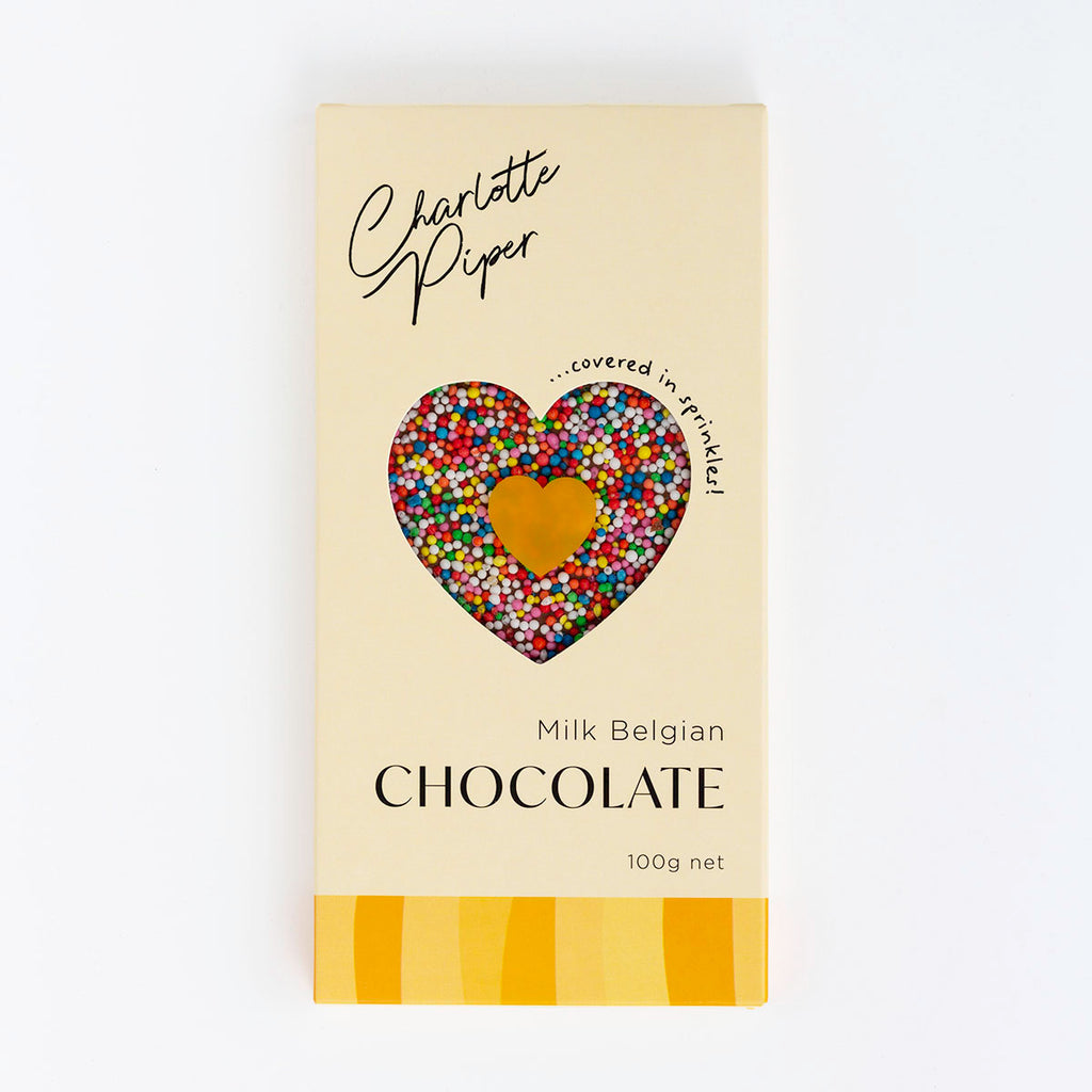 Chocolate bar packaging with a heart-shaped chocolate piece and 'Charlotte Piper' branding on a white background.