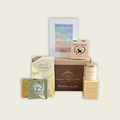 Heartfelt Comfort pet memorial gift box featuring a custom wooden keepsake box, framed poem, candle, tea, and treats.