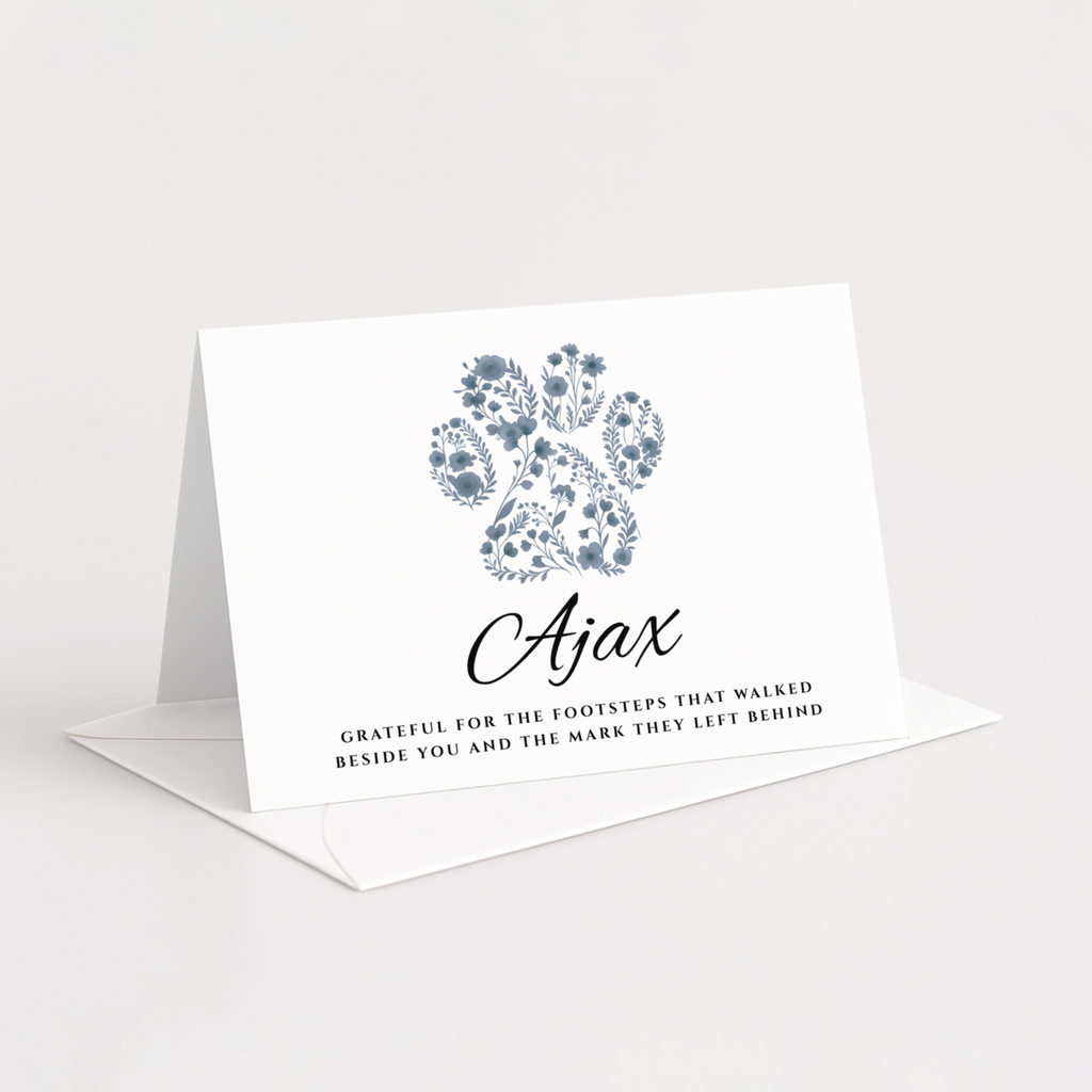 Personalised pet sympathy card with floral paw print and custom pet name.