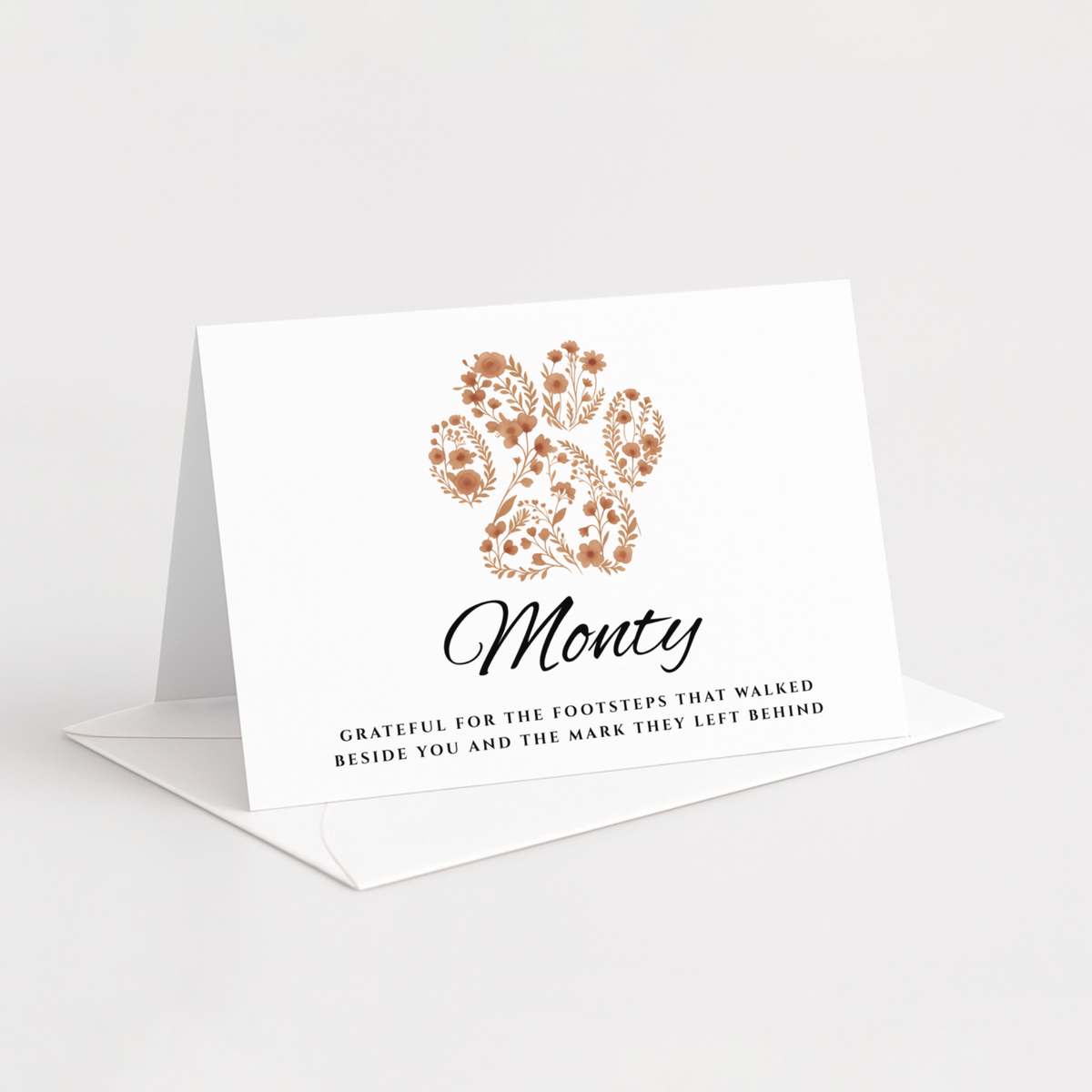 Personalised pet sympathy card with floral paw print and custom pet name.