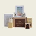 The Remembrance Mini pet memorial gift box includes personalised ceramic ornament, candle, premium sweet treats, tiger's eye heart.