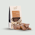 Packaged milk Belgian chocolate bark with biscoff flavor on a light gray background